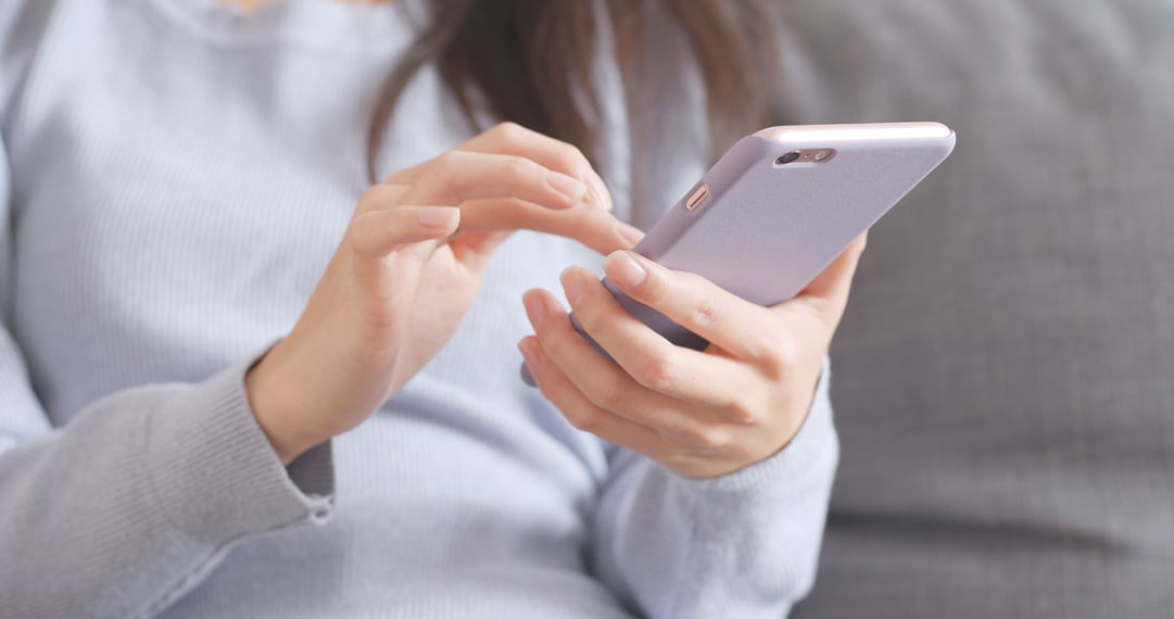 Woman Using Mobile Phone