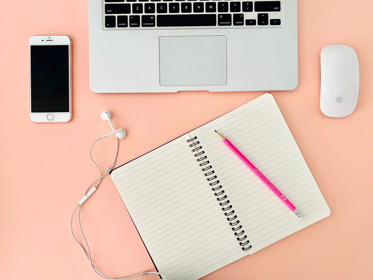 Electronic devices and copybook on table